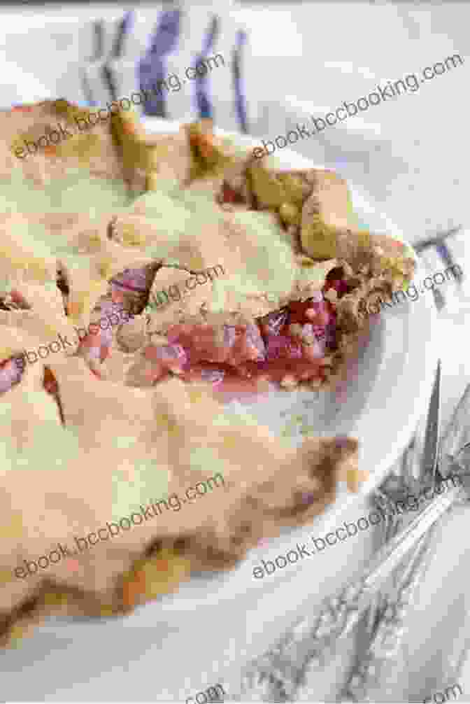 A Photo Of A Traditional Swedish Rhubarb Pie With A Golden Brown Crust And A Vibrant Rhubarb Filling. Guide To Cooking Nordic Bakery Delicious: With More 77 Recipes For Authentic Nordic Desserts