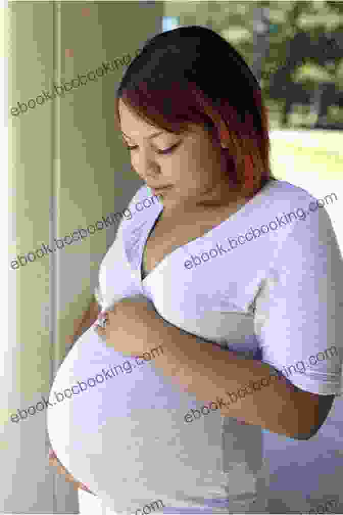 A Pregnant Woman Holding Her Belly, Symbolizing The Miracle Of Pregnancy Maternity And Women S Health Care E
