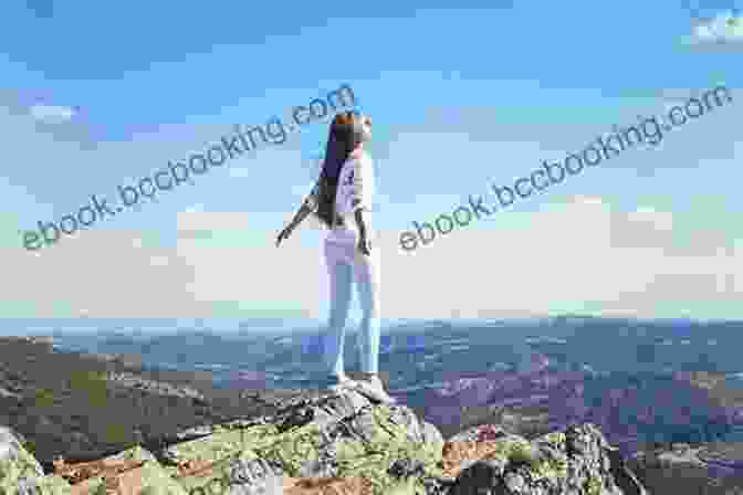 A Young Woman Standing On A Mountaintop, Looking Out At The World. A Girl S Journey