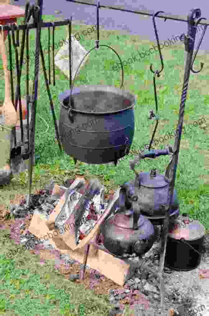 Campfire Burning Brightly With A Cast Iron Pot Hanging Over It Camping Cookbook Beyond Marshmallows And Hot Dogs: Foil Packet Grilling Campfire Cooking Dutch Oven (Camp Cooking)