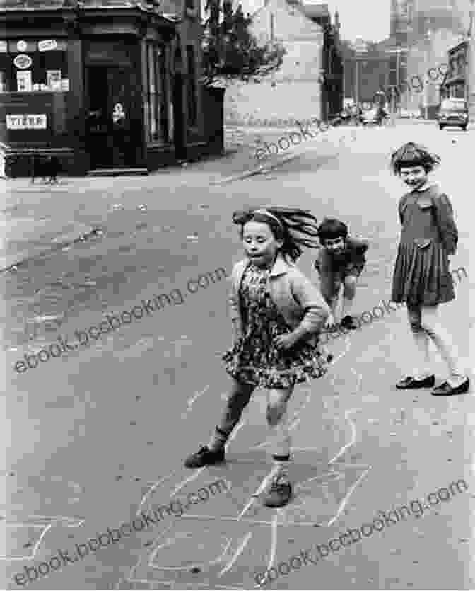 Children Playing Hopscotch On A Sidewalk In The 1950s. Britain In The 1950s For Kids: Living History