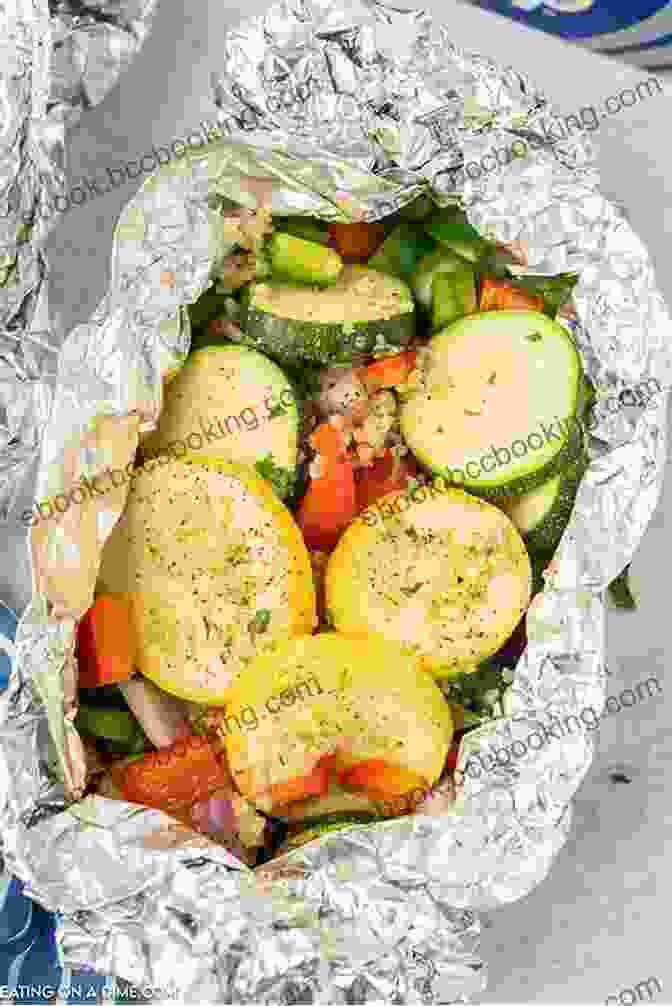 Colorful Foil Packets Filled With Grilled Vegetables, Meat, And Seafood On A Grill Camping Cookbook Beyond Marshmallows And Hot Dogs: Foil Packet Grilling Campfire Cooking Dutch Oven (Camp Cooking)