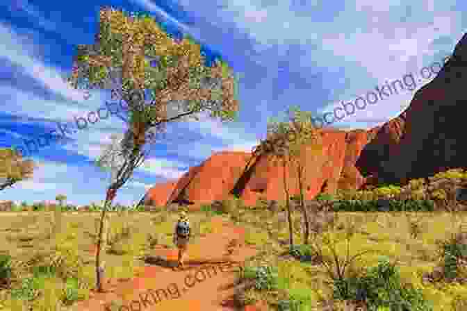 Hikers Exploring The Red Centre's Rugged Landscapes Songlines And Fault Lines: Epic Walks Of The Red Centre