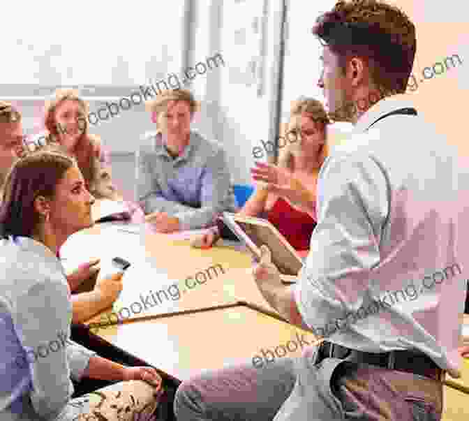Teacher Facilitating A Group Discussion I Used To Hate School: 5 Proven Principles For Success In Education