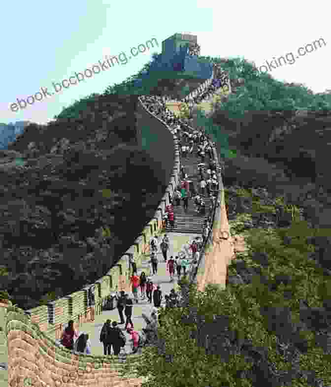 Tourists Visiting A Section Of The Great Wall Of China, Showcasing Its Cultural And Historical Significance Great Wall Of China (Ancient Wonders)