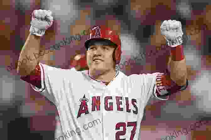 Young Mike Trout Holding A Baseball Bat Mike Trout (Famous Athletes)